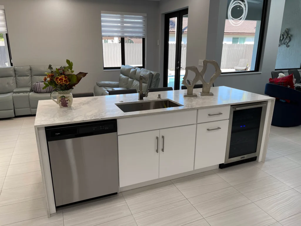 Island sink side with dishwasher and beverage fridge