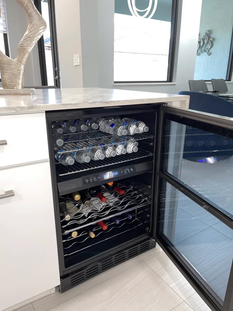 Built-in wine fridge at the end of a kitchen island