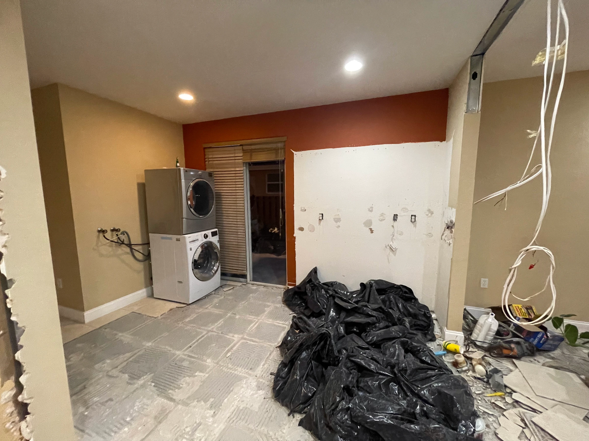 Former laundry wall during demolition before the new kitchen