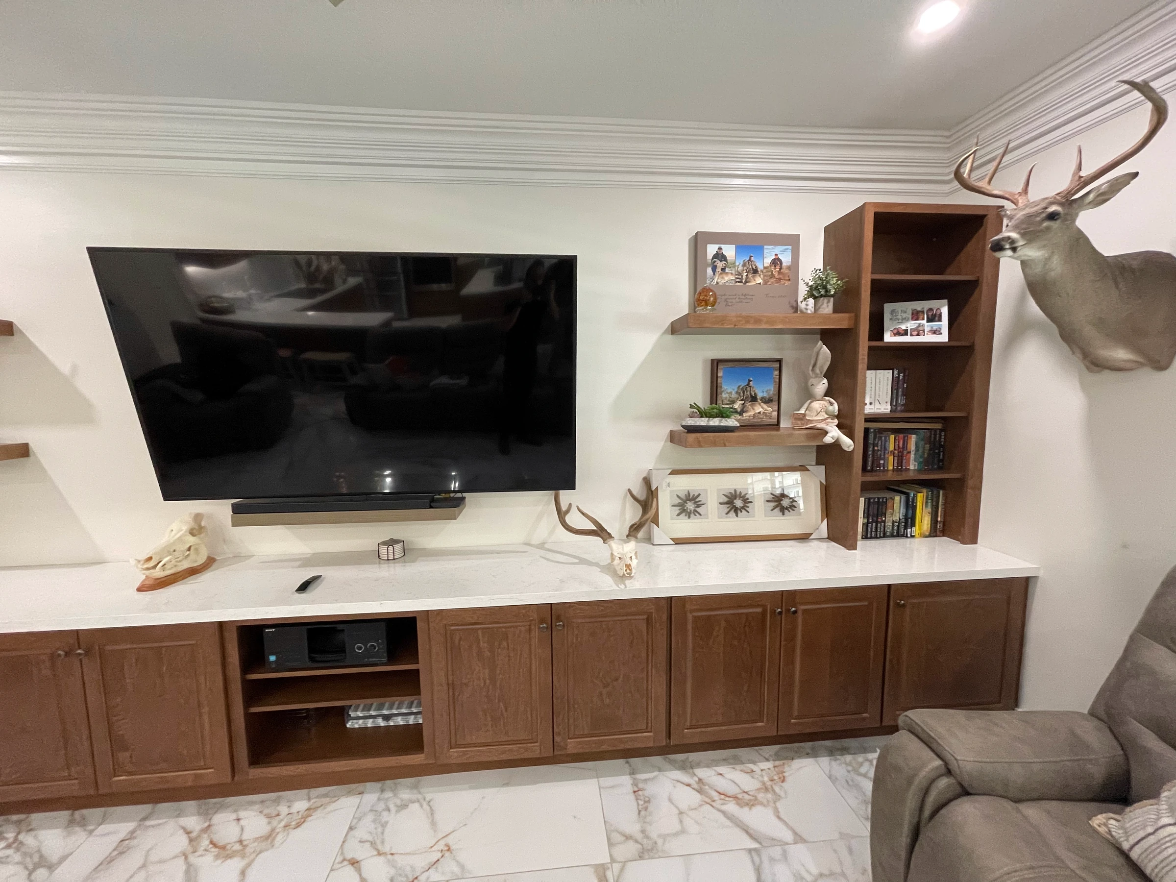 Custom TV console and bookcase in matching wood finish