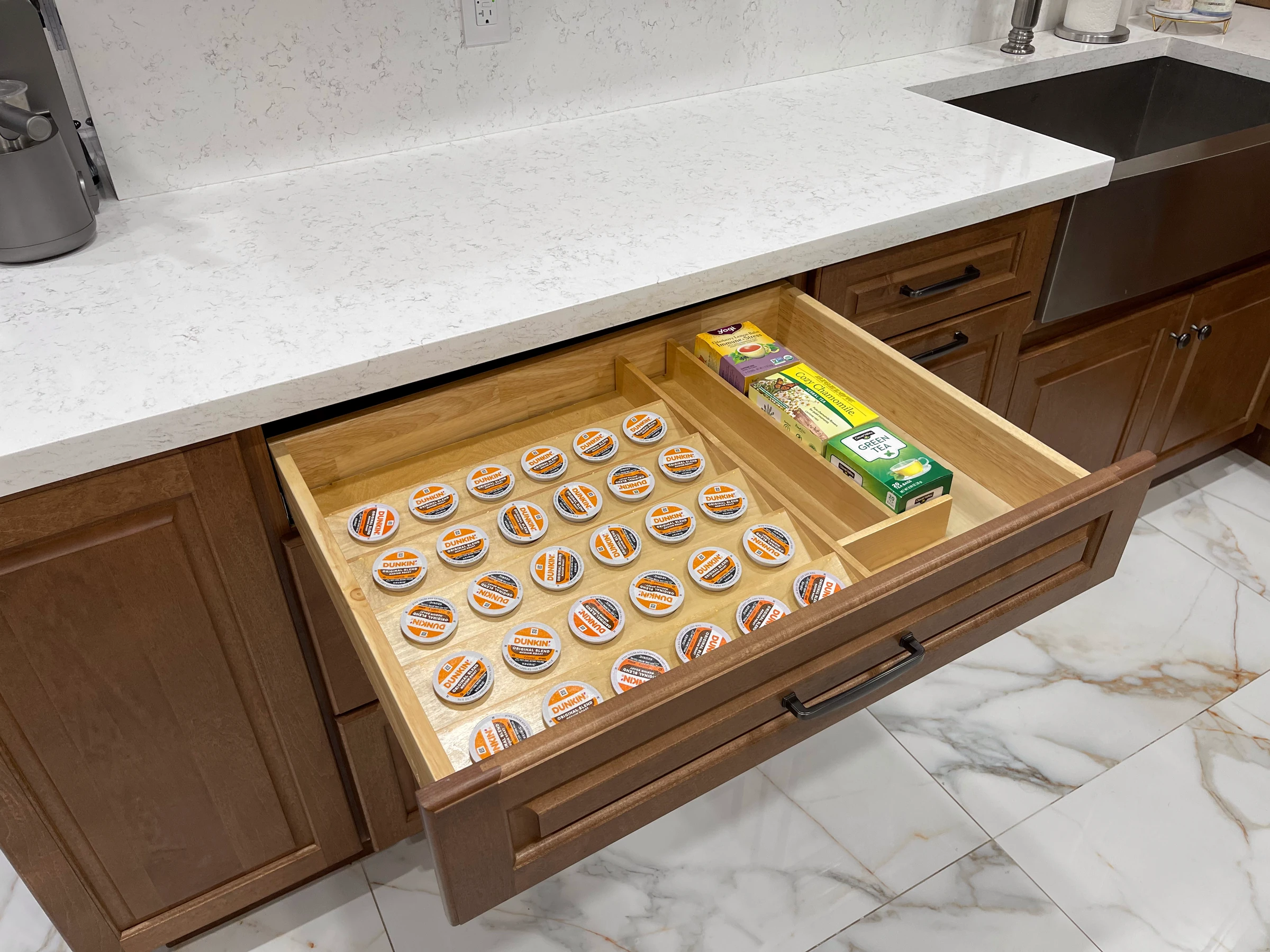 Drawer with a built-in coffee pod organizer